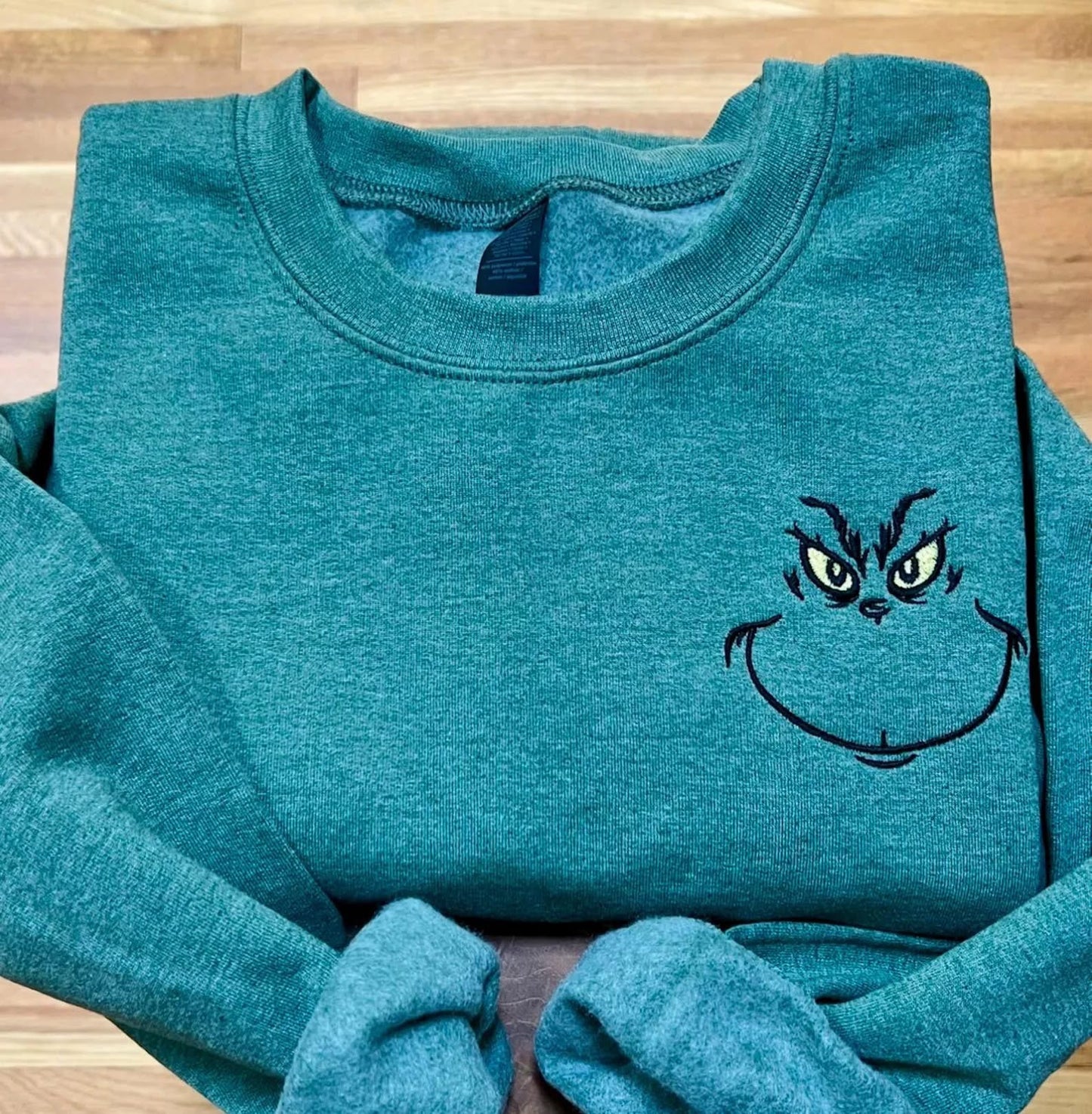Embroidered green man sweatshirt